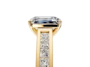 Solitaire Engagement Ring Setting for Emerald Cut Center with Princess Cut Channel Band and Prong Head in Yellow Gold