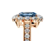Halo Engagement Ring Setting for Fancy Blue Emerald Cut Center with Milgrain Channel Band and Prong Head in Rose Gold