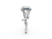 Halo Engagement Ring Setting for Fancy Blue Emerald Cut Center with Leaf Motif Split Shank and Prong Head in Platinum