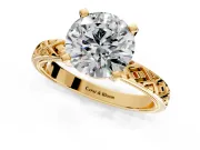 Solitaire Engagement Ring Setting for Round Cut Center with Milgrain X Pattern Band and Prong Head in Yellow Gold