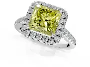 Halo Engagement Ring Setting for Fancy Yellow Princess Cut Center with Narrowing Pave Band and Prong Head in Platinum