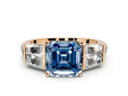Channel-Set Engagement Ring Setting for Fancy Blue Asscher Cut Center with Baguette Band and Prong Head in Rose Gold
