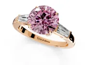 3 Stone Engagement Ring Setting for Fancy Pink Round Cut Center with Baguette Accents and Prong Head in Rose Gold