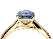 Solitaire Engagement Ring Setting for Fancy Blue Radiant Cut Center with Narrow Cathedral Band and Prong Head in Yellow Gold