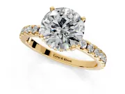 Solitaire Engagement Ring Setting for Round Cut Center with Band of Accents and Prong Head in Yellow Gold