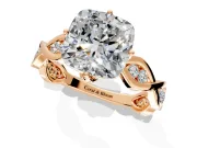 Solitaire Engagement Ring Setting for Cushion Cut Center with Accented Twist Band and Leaf Prong Head in Rose Gold