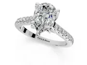 Solitaire Engagement Ring Setting for Pear-Shaped Center with Widening Pave Band and Claw Prong Head in White Gold