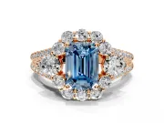 Halo Engagement Ring Setting for Fancy Blue Emerald Cut Center with Two-Strand Split Shank and Prong Head in Rose Gold