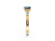 3 Stone Engagement Ring Setting for Fancy Blue Cushion Cut Center with Channel Baguette Accents and Prong Head in Yellow Gold