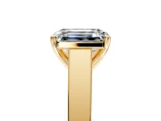 Solitaire Engagement Ring Setting for Emerald Cut Center with Tapered Split Shoulders and Prong Head in Yellow Gold