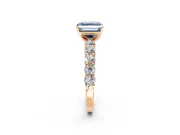 Shared-Prong Engagement Ring Setting for Fancy Blue Asscher Cut Center with Graduated Accents and Prong Head in Rose Gold