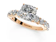 Shared-Prong Engagement Ring Setting for Cushion Cut Center with Graduated Accents and Prong Head in Rose Gold