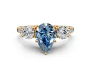 3 Stone Engagement Ring Setting for Fancy Blue Pear-Shaped Center with Crossover Basket, Pave Band and Prong Head in Yellow Gold