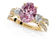 3 Stone Engagement Ring Setting for Fancy Pink Oval Center with Pave Twist Band and Prong Head in Yellow Gold