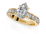 Solitaire Engagement Ring Setting for Pear-Shaped Center with Channel-Set Accents and Prong Head in Yellow Gold