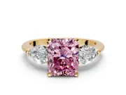 3 Stone Engagement Ring Setting for Fancy Pink Radiant Cut Center with Large Pear-Shaped Accents and Prong Head in Yellow Gold
