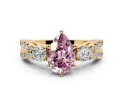 3 Stone Engagement Ring Setting for Fancy Pink Pear-Shaped Center with Pave Split Shank and Prong Head in Yellow Gold