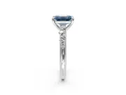 Solitaire Engagement Ring Setting for Fancy Blue Emerald Cut Center with Trailing Leaf Accent Band and Prong Head in Platinum