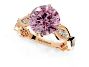 Solitaire Engagement Ring Setting for Fancy Pink Round Cut Center with Accented Twist Band and Leaf Prong Head in Rose Gold