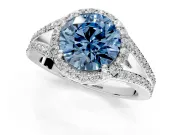 Halo Engagement Ring Setting for Fancy Blue Round Cut Center with Pave Split Shank and Prong Head in White Gold