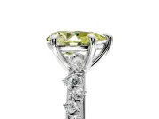 Solitaire Engagement Ring Setting for Fancy Yellow Pear-Shaped Center with Trailing Leaf Accent Band and Prong Head in Sterling Silver