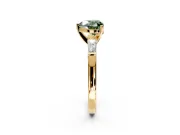 3 Stone Engagement Ring Setting for Fancy Green Heart-Shaped Center with Tapered Baguettes, Plain Band and Prong Head in Yellow Gold