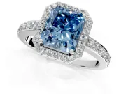 Halo Engagement Ring Setting for Fancy Blue Radiant Cut Center with Heart-Shaped Openwork, Pave Band and Prong Head in White Gold