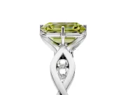Solitaire Engagement Ring Setting for Fancy Yellow Emerald Cut Center with Accented Twist Band and Leaf Prong Head in Platinum