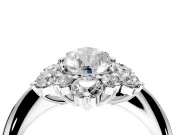 Small-Accent Cluster Halo Engagement Ring Setting for Pear-Shaped Center with Plain Band and Prong Head in White Gold