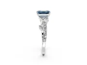 Leaf Motif Engagement Ring Setting for Fancy Blue Emerald Cut Center with Pave Band and Prong Head in Platinum