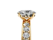 Solitaire Engagement Ring Setting for Oval Center with Channel-Set Accents and Prong Head in Yellow Gold