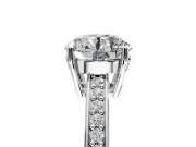 Solitaire Engagement Ring Setting for Round Cut Center with Channel-Set Accent Band and Prong Head in White Gold