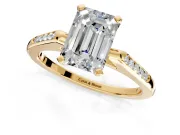Solitaire Engagement Ring Setting for Emerald Cut Center with Channel Accents and Prong Head in Yellow Gold