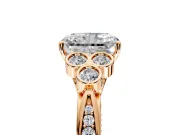 Cluster Engagement Ring Setting for Radiant Cut Center with Bezel Accent Clusters and Prong Head in Rose Gold