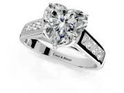 Solitaire Engagement Ring Setting for Heart-Shaped Center with Cathedral Channel Band and Prong Head in Platinum