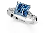 3 Stone Engagement Ring Setting for Fancy Blue Princess Cut Center with Tapered Baguettes, Plain Band and Prong Head in White Gold