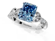 Leaf Motif Engagement Ring Setting for Fancy Blue Radiant Cut Center with Pave Band and Prong Head in Platinum