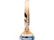 Side Accent Engagement Ring Setting for Fancy Blue Emerald Cut Center with Accent Shoulders and Prong Head in Rose Gold