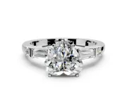 Bar-Set Engagement Ring Setting for Heart-Shaped Center with Tapered Baguette Accents and Prong Head in Platinum