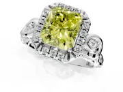 Halo Engagement Ring Setting for Fancy Yellow Radiant Cut Center with Open Scroll Shoulders and Prong Head in Platinum