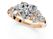 Cluster Engagement Ring Setting for Heart-Shaped Center with Round Cut Accent Frame and Prong Head in Rose Gold