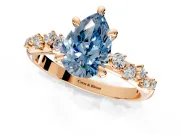 Solitaire Engagement Ring Setting for Fancy Blue Pear-Shaped Center with Trailing Leaf Accent Band and Prong Head in Rose Gold