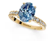 Solitaire Engagement Ring Setting for Fancy Blue Oval Center with Fine Pave Band and Claw Prong Head in Yellow Gold