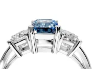 3 Stone Engagement Ring Setting for Fancy Blue Emerald Cut Center with Matching Side Accents and Prong Head in Platinum