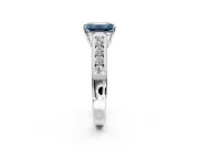 Solitaire Engagement Ring Setting for Fancy Blue Emerald Cut Center with Cathedral Channel Band and Prong Head in Platinum