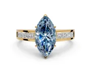 Solitaire Engagement Ring Setting for Fancy Blue Marquise Center with Princess Cut Channel Band and Prong Head in Yellow Gold