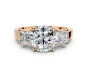 3 Stone Engagement Ring Setting for Round Cut Center with Matching Side Accents and Prong Head in Rose Gold