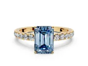 Solitaire Engagement Ring Setting for Fancy Blue Emerald Cut Center with Large Accent Band and Prong Head in Yellow Gold