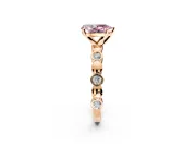Solitaire Engagement Ring Setting for Fancy Pink Pear-Shaped Center with Beaded Bezel Station Band and Prong Head in Rose Gold