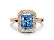 Halo Engagement Ring Setting for Fancy Blue Radiant Cut Center with Plain Tapered Band and Prong Head in Rose Gold